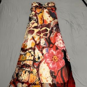 Small, Strapless Multi colored pattern with Red, black, blue, and yellow.